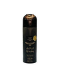 The image displays a tall, narrow perfume spray bottle with a black background and intricate gold detailing. The central label reads "Perfumed Spray" in English with "Al bashiq" beneath it in stylized script. Arabic calligraphy is also present, which likely mirrors the branding and product name. The label mentions "Long Lasting" and the brand "Nabeel". It appears to be a unisex fragrance, as indicated by the design elements.