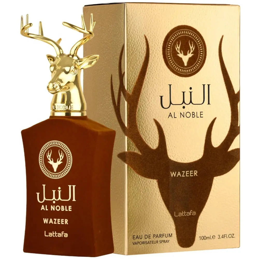he image shows a set consisting of a perfume bottle and its packaging box. The bottle is a rich amber color with a gold cap shaped like a deer's head with antlers. It has gold lettering that reads "AL NOBLE," "WAZEER," and "Lattafa," with a stag emblem in a circle. The accompanying box is gold with a textured look and features a large stag silhouette with the text "AL NOBLE" and "WAZEER" above and below it, along with the product details "Eau de Parfum, 100ml, 3.4fl.oz."