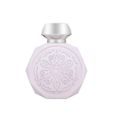 A pale pink, octagonal perfume bottle with intricate, embossed designs on the front. The bottle features a sleek, metallic silver cap that contrasts with the delicate design. The detailed pattern on the bottle adds an elegant and sophisticated touch to its overall appearance.