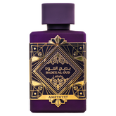 Purple Bade’e Al Oud Amethyst perfume bottle with gold geometric label on white background.