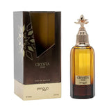 The image features a fragrance product named "CRYSTA OUD" by Zimaya. On the left is the packaging box. On the right side of the image is the perfume bottle, showing a clear glass with a warm amber-colored liquid inside. The bottle has a classic design with a vintage-inspired spray nozzle and a decorative element on top, resembling a flower. The label on the bottle is simple and elegant with the name "CRYSTA OUD" and the Zimaya brand name just below. The size of the perfume is indicated as 100ml (3.4 fl.oz).
