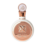 The image features a round, flat white perfume bottle with a rose gold cap and intricate rose gold detailing on the front. The central design is an ornate butterfly, surrounded by a braided border, with the name "Fakhar Lattafa" written below. The cap has the brand's logo "Lattafa" in stylized Arabic calligraphy. The aesthetic suggests a feminine and elegant fragrance product.