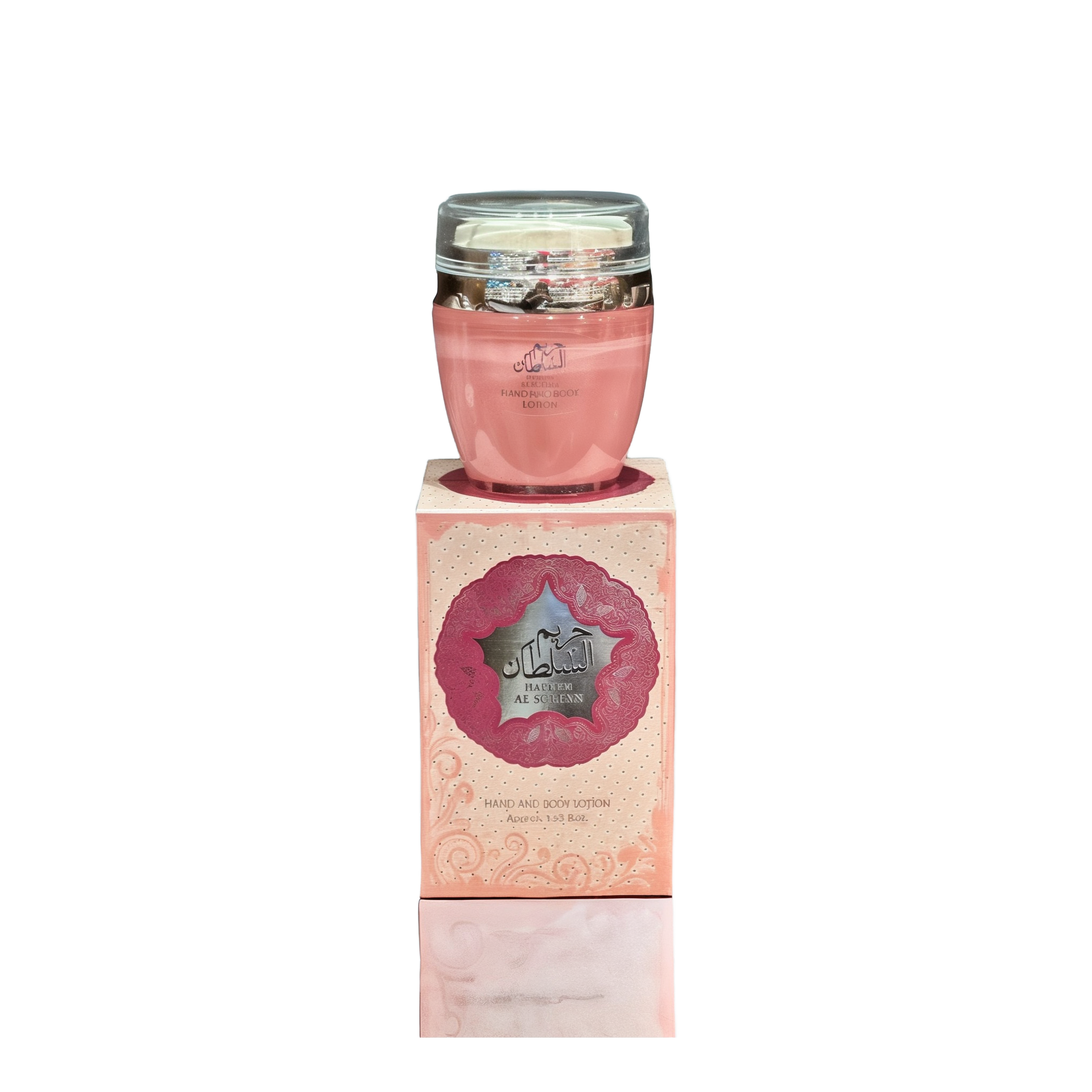 The image shows a product named "Hareem Al Sultan Hand and Body Lotion." The lotion comes in a pink container with a clear lid and is placed on top of a matching pink box adorned with intricate patterns and Arabic calligraphy. The box prominently features the product name "Hareem Al Sultan" within an ornate design in pink and silver. The elegant and regal packaging suggests a luxurious and high-quality skincare product. The container holds approximately 1.53 fluid ounces of lotion.