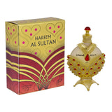 The image shows a richly decorated perfume box alongside a perfume bottle. The box has "HAREEM AL SULTAN" printed in bold, capital letters on a yellow and red patterned background, featuring heart and dot motifs, and a large abstract floral design in red and purple hues. Below the name, it states "Concentrated Oil Perfume 35 ml" in a smaller font.