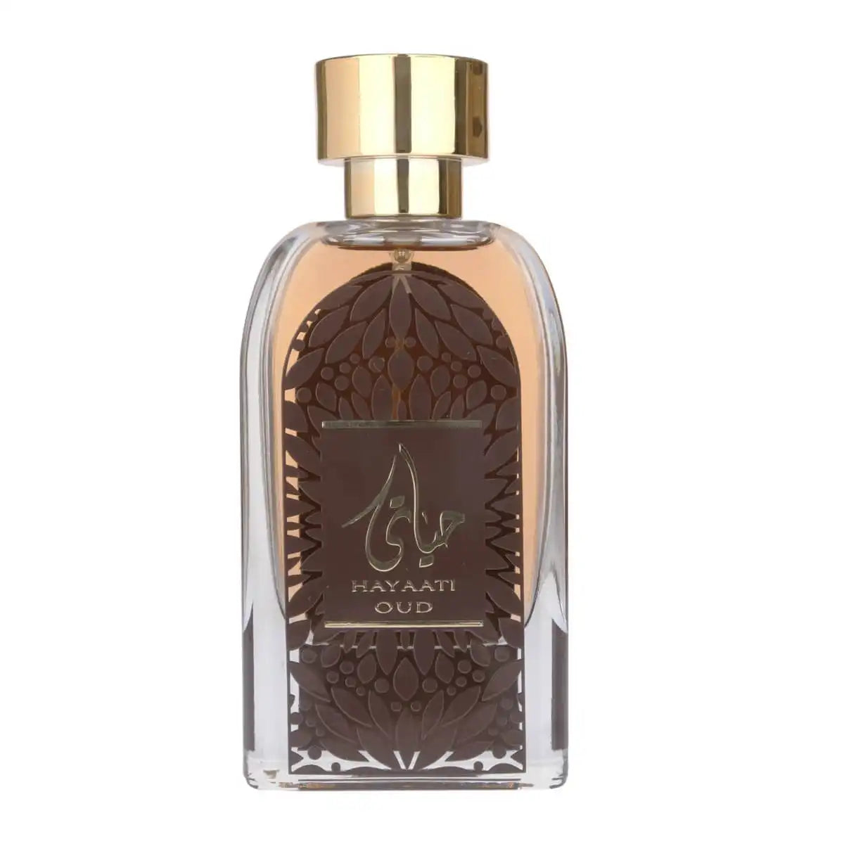 The image shows a clear glass perfume bottle with a golden cap. The perfume liquid is a dark amber color. The front of the bottle features a decorative motif resembling a dome with geometric patterns in brown and a central label with the name "HAYAATI OUD" in gold lettering and elegant Arabic calligraphy. The overall design suggests an opulent and exotic fragrance, and the bottle is set against a plain white background to emphasize its design and contents.