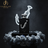 Lattafa Ishq Al Shuyukh Silver perfume bottle with glowing dagger outline and smoke.