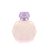 A pastel pink octagonal perfume bottle with intricate embossed designs on the front. The bottle features a matching pastel purple cap and a silver collar, adding a touch of elegance and sophistication. The soft colors and detailed patterns give the bottle a delicate and luxurious appearance, perfect for a high-end fragrance.