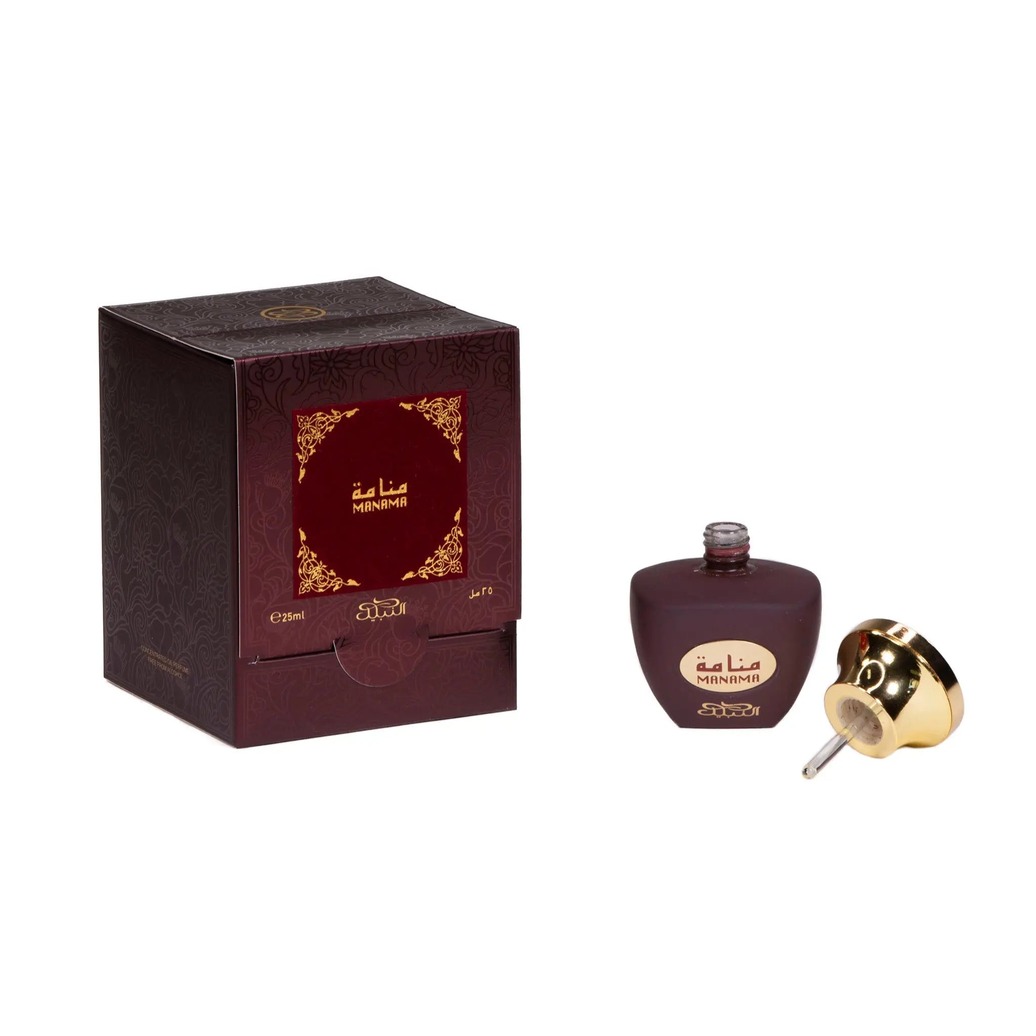 The image presents a dark brown perfume bottle with its cap removed, revealing a silver applicator rod. The bottle is labeled "MANAMA" in both Arabic and English script. The golden cap lies beside it. The bottle is part of a set with its packaging, a matching dark brown box that has a golden frame around a label with the same "MANAMA" branding, and ornate floral patterns embossed into the box. 