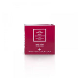 An image of a bold red box with a white label that includes the name "ABAQ POMEGRANATE" and "MUSK CUBES" in English and Arabic, indicating a pomegranate-scented product by "IBRAHEEM AL QURASHI." The packaging is simple yet elegant, with a solid red color and contrasting white text, presented against a pure white background which enhances the visual appeal and suggests a luxury fragrance product.