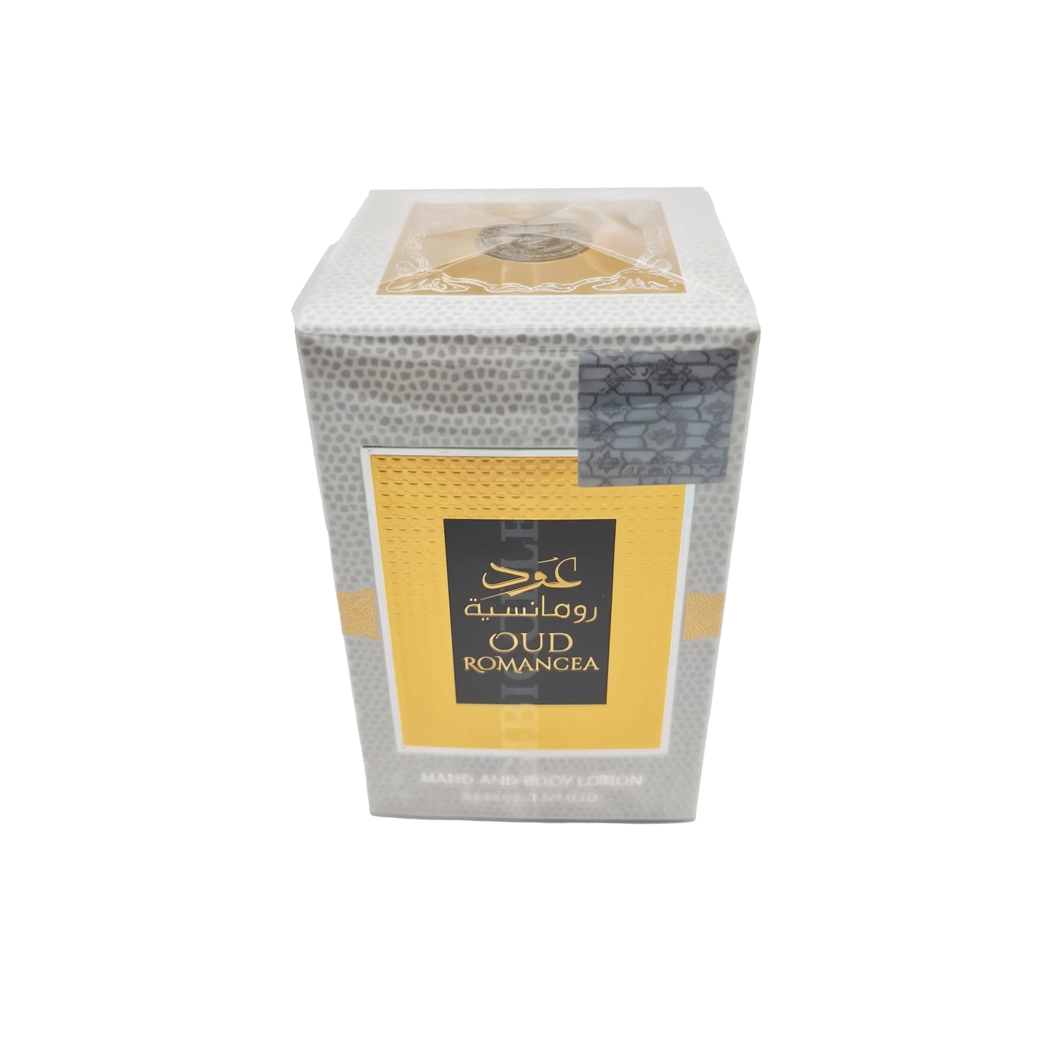 The image features a box of OUD ROMANCEA hand and body lotion. The box has a textured gray pattern resembling reptile skin, with a bold yellow band across the center featuring the product name in both Arabic and English. At the top of the box, there is a transparent section revealing a golden emblem design, while the lower part includes details about the product in smaller text. The overall design of the packaging suggests a luxurious and exotic product.