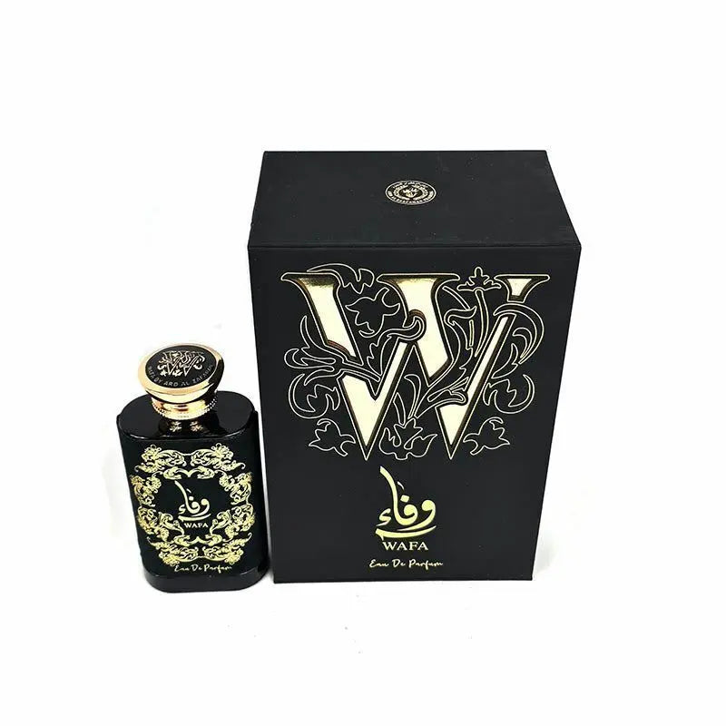 A matte black perfume bottle with gold ornate details and Arabic calligraphy reading "WAFA" is displayed in front of its matching black packaging. The box is adorned with a large, stylized gold letter "W" and the word "WAFA" in both Arabic and English script, with "Eau De Parfum" written beneath. Both items feature a circular emblem at the top. The bottle's cap also has a gold band matching the design. 