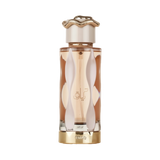 The bottle has a sleek, elongated shape with a clear glass revealing the amber-colored perfume inside.