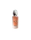 The image shows a frosted glass perfume bottle with a metallic, ribbed cap. The bottle has a soft pink hue and features the label "YARA" in both English and Arabic scripts. Below the brand name, it states "FRESH HAIR MIST" in smaller English lettering, along with Arabic translation. The design of the bottle suggests a delicate and feminine hair fragrance product.