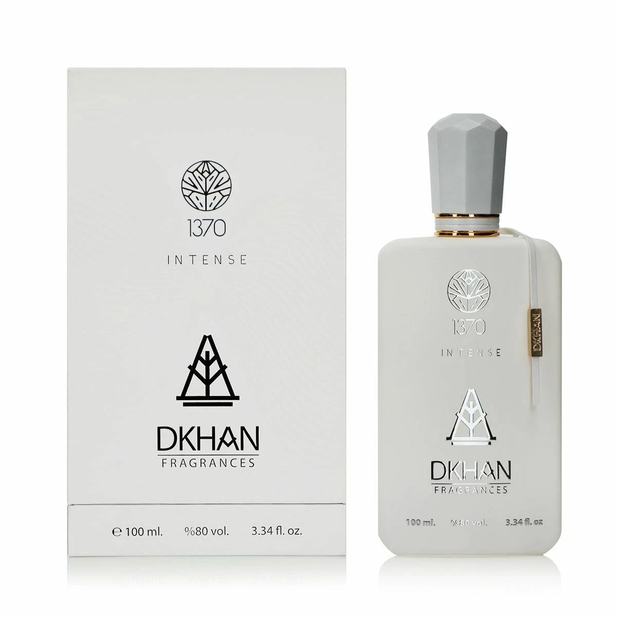 The image shows a frosted glass perfume bottle with a matte finish and a silver cap, standing next to its packaging. The bottle and the box both prominently feature the embossed branding "1370 INTENSE" and the "DKHAN FRAGRANCES" emblem. Above the branding on both items, a leaf-like logo is present. On the bottle's right side, there is a slender vertical label with additional details. The box mimics the bottle's color and has a subtle texture with curved lines radiating from the center.