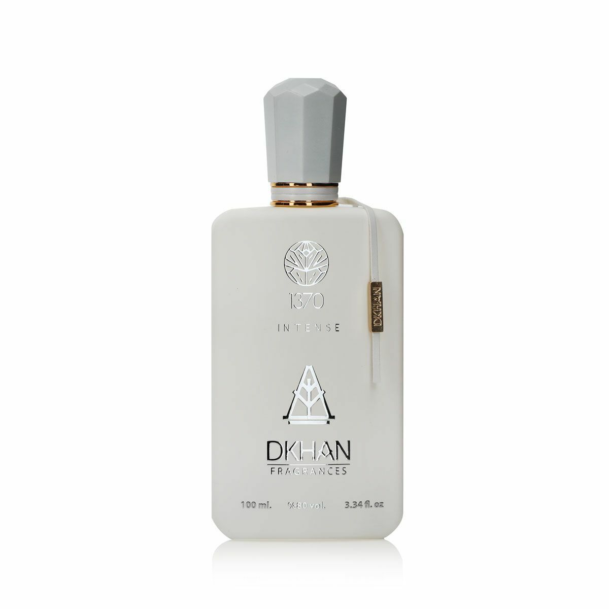 The image displays an elegant, matte-finished, frosted glass perfume bottle with a silver cap. On the front, the bottle is embossed with the number "1370" above the word "INTENSE", and below that is the emblem of "DKHAN FRAGRANCES". A leaf-like logo is printed above the number "1370". On the side of the bottle is a slender vertical label with additional branding details.