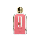 A bottle of "9 AM Pour Femme" perfume by Afnan, featuring a sleek rectangular glass design with a bold pink label, large white number "9", and gold accents including a round, reflective gold cap. The text on the label reads "9 am pour femme" and "Afnan Eau De Parfum Vaporisateur 100ml 3.4 fl.oz".