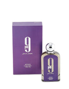 The image shows a perfume set including a bottle and its packaging box. The bottle is rectangular with rounded edges, featuring a purple label with a white number "9" and the text "pm pour femme" in lowercase white font. The brand "AFNAN" is printed at the bottom in white. The bottle has a silver spherical cap and a clear glass body.  The box states "eau de parfum vaporisateur" and the size "100ml 3.4fl.oz." indicating the fragrance quantity and type.