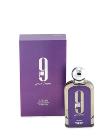 The image shows a perfume set including a bottle and its packaging box. The bottle is rectangular with rounded edges, featuring a purple label with a white number "9" and the text "pm pour femme" in lowercase white font. The brand "AFNAN" is printed at the bottom in white. The bottle has a silver spherical cap and a clear glass body.  The box states "eau de parfum vaporisateur" and the size "100ml 3.4fl.oz." indicating the fragrance quantity and type.