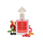 The image shows a product, which is a bottle of perfume named "ABAQ POMEGRANATE MUSK" by Ibraheem Al Qurashi. The perfume bottle has a clear, ornate design with a gold-colored cap featuring intricate patterns. The liquid inside the bottle is a rich red color, and the label is red with white and gold text. Surrounding the bottle are several pomegranates and loose pomegranate seeds, as well as a few black currants, which are likely meant to suggest the fragrance notes of the perfume. 