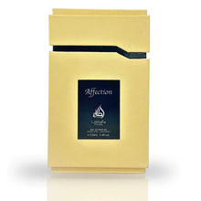The image displays a perfume box for "Affection" by Lattafa Pride. The box is a matte gold color, providing a luxurious look. On the front is a black label with the product name "Affection" in white, along with the Lattafa logo in white above it. The labe