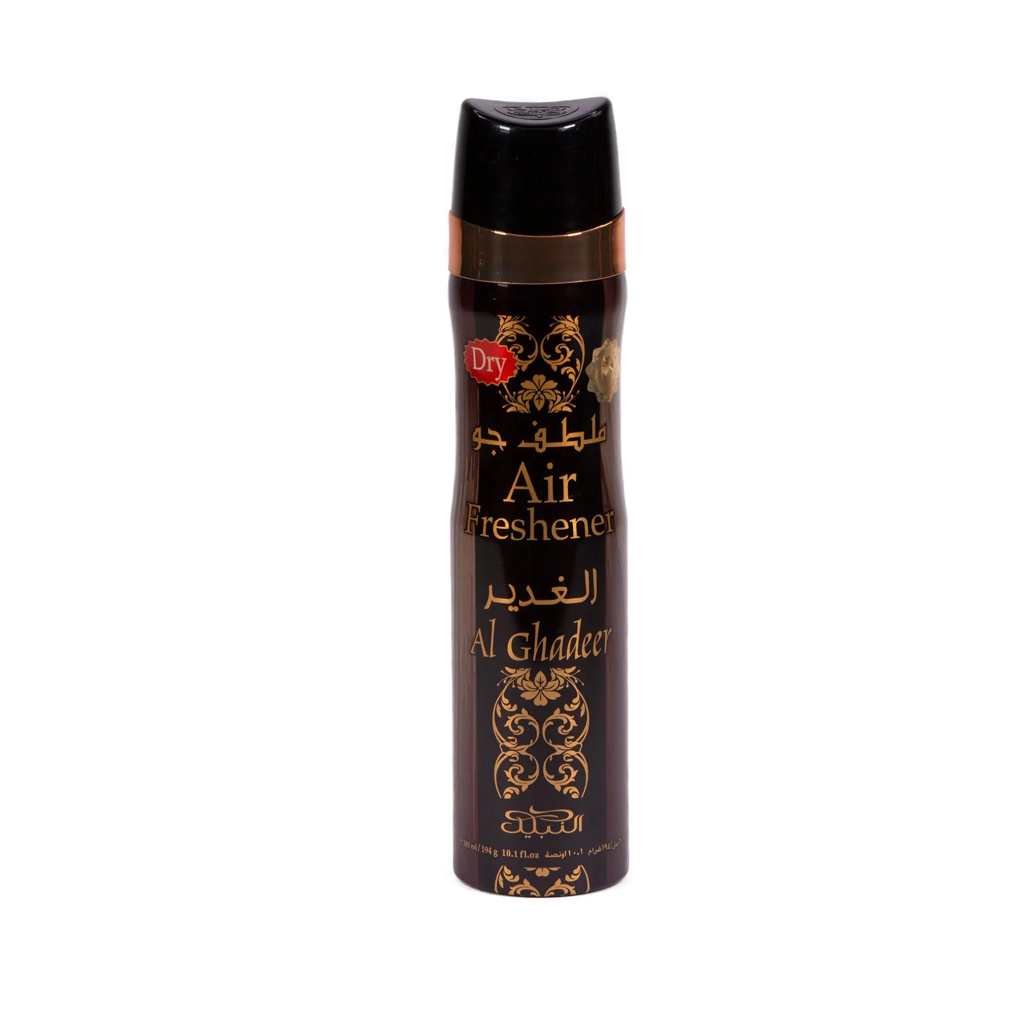 The image displays an air freshener can with a glossy black body and a brown cap. The can has a copper band near the top and features elaborate golden decorative motifs and scrollwork. It has Arabic calligraphy at the top, and below in English it says "Air Freshener" and "Al Ghadeer" in gold lettering. The brand name in Arabic script is also visible at the bottom. The background is plain white, accentuating the can's details and colors.
