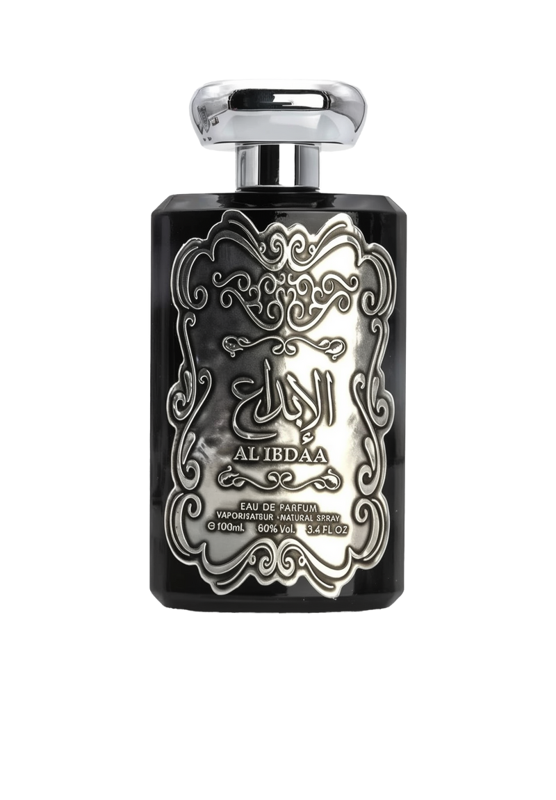The image features a black perfume bottle with a detailed silver embossed design on the front. The central design includes Arabic calligraphy that reads 'AL IBDAA', likely the name of the fragrance. Below the calligraphy, in smaller English text, it states 'EAU DE PARFUM', 'VAPORISATEUR NATURAL SPRAY', '100ml', '80% VOL', and '3.4 FL.OZ', which describe the product type, dispensing method, volume, alcohol content, and fluid ounces, respectively. 