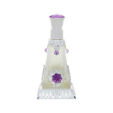 A pyramid-shaped perfume bottle with intricate silver detailing and purple accents, featuring a purple flower design on the front.