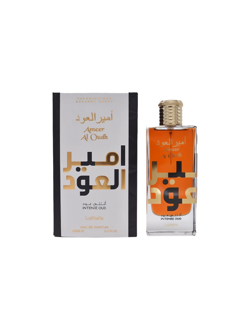 Image of Ameer Al Oudh Intense Oud by Lattafa, a unisex oriental Eau De Parfum. The perfume bottle is rectangular with a gold cap and features Arabic script and the name 'Ameer Al Oudh' in English. The packaging box is white with black and gold accents, displaying the same text in Arabic and English