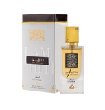 A perfume box and bottle set for 'Ana Abiyedh Leather' by Lattafa. The box is white with gold and black accents, featuring Arabic and English text that reads 'I Am White' in embossed letters. The bottle is clear with a gold label and a square gold cap ado