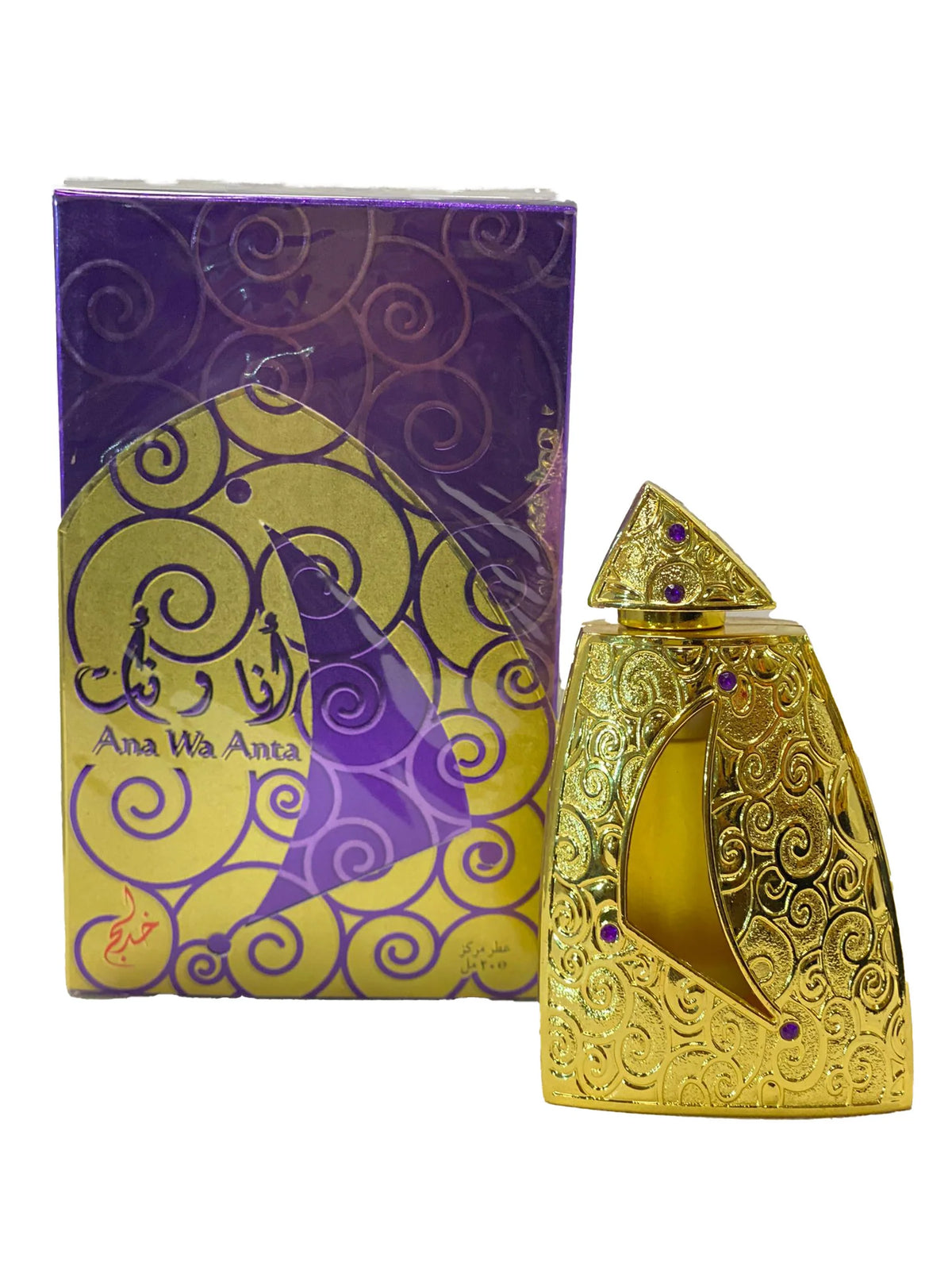 The image shows a product called "Ana Wa Anta" by Khadlaj, which is a concentrated perfume oil. The perfume is housed in a uniquely designed gold bottle adorned with intricate swirling patterns and purple gems. The bottle has a triangular cap and a crescent-shaped window revealing the golden liquid inside. The packaging box features a matching gold and purple design with swirling patterns and the product name "Ana Wa Anta" displayed in both English and Arabic.