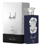 Ansaam Silver perfume bottle with floral silver design beside matching silver and black box.