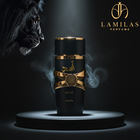 Lattafa Asad perfume, a matte black bottle with gold X-band, sitting dramatically on a pedestal.