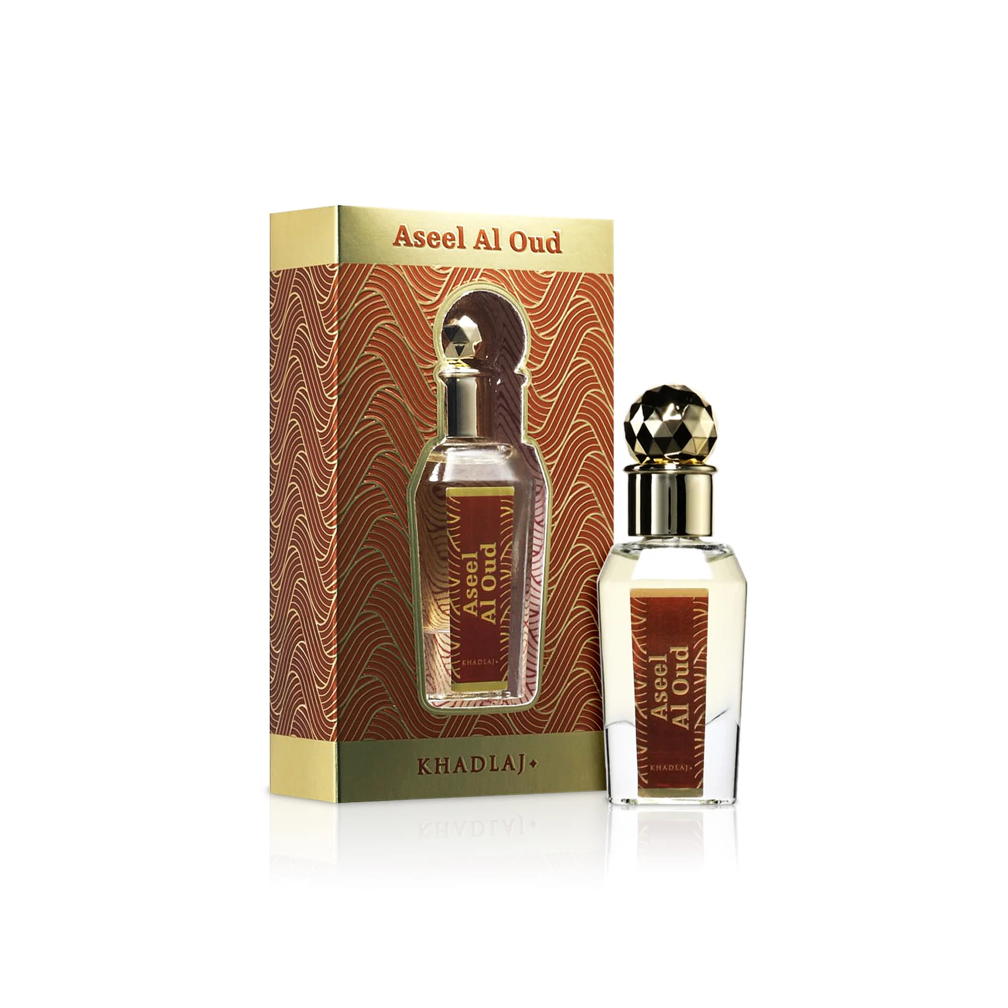 Khadlaj Aseel Al Oud perfume oil with gold patterned box and faceted gold-capped bottle.