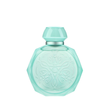 A pastel blue octagonal perfume bottle with intricate embossed designs on the front. The bottle features a matching pastel blue cap and a silver collar, adding a touch of elegance and sophistication. The soft blue color and detailed patterns give the bottle a delicate and luxurious appearance, perfect for a high-end fragrance.