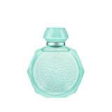 A pastel blue octagonal perfume bottle with intricate embossed designs on the front. The bottle features a matching pastel blue cap and a silver collar, adding a touch of elegance and sophistication. The soft blue color and detailed patterns give the bottle a delicate and luxurious appearance, perfect for a high-end fragrance.