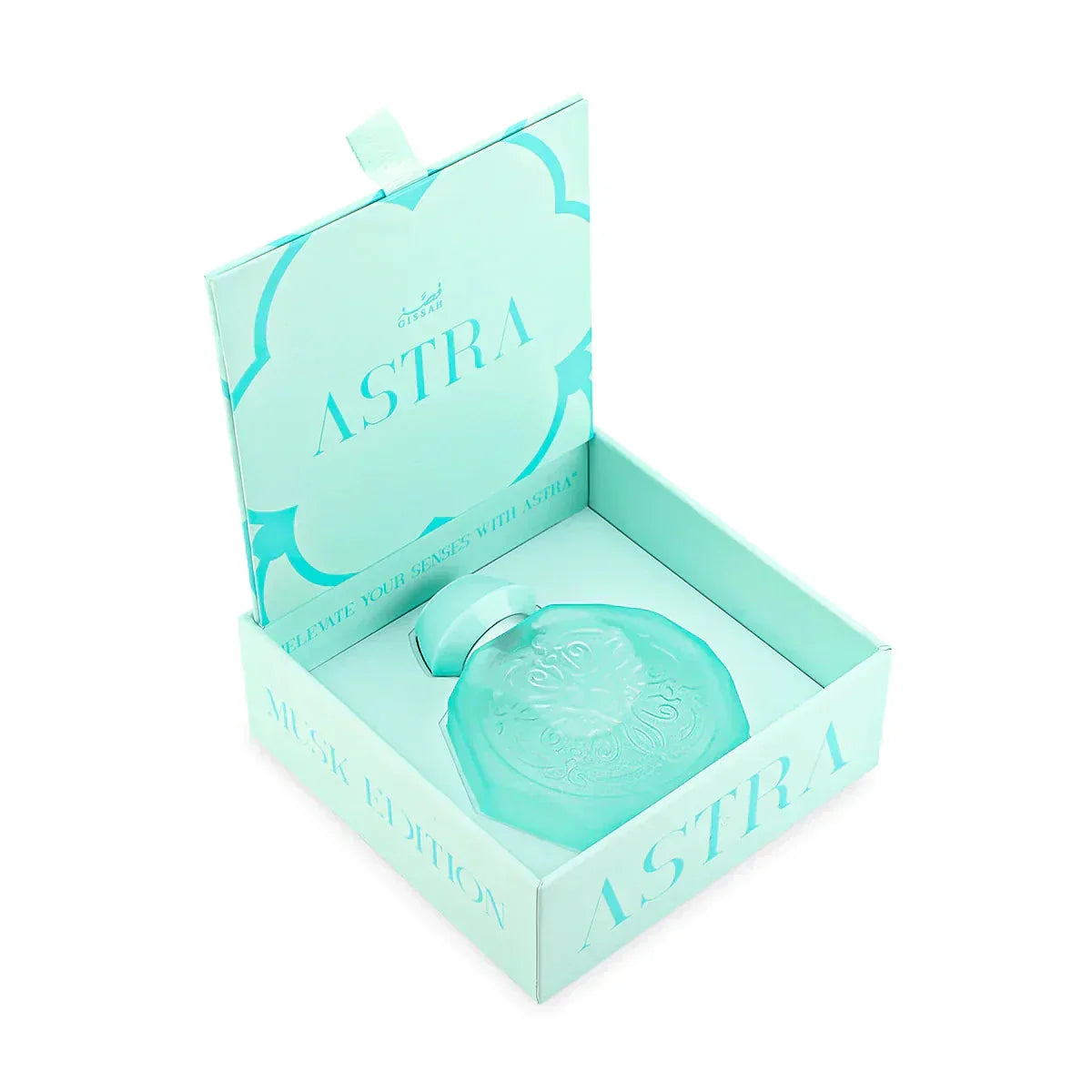 A pastel blue octagonal perfume bottle with intricate embossed designs on the front, nestled inside an open pastel blue box. The bottle features a matching pastel blue cap and a silver collar. The box is labeled "Astra Musk Edition" with the Gissah brand name and the phrase "Elevate Your Senses with Astra." The interior and exterior of the box are decorated with elegant patterns that complement the delicate and luxurious appearance of the bottle.