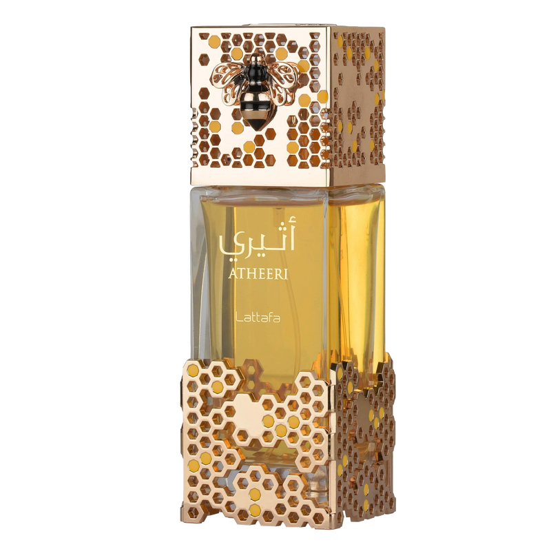 Golden perfume bottle with honeycomb-patterned casing, bee emblem cap, and Atheeri Lattafa branding.