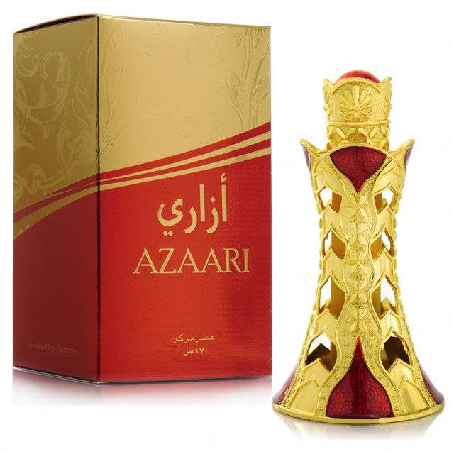 The image shows a product called "Azaari" by Khadlaj, which is a concentrated perfume oil. The perfume bottle has an elegant and regal design with gold accents and red velvet-like material visible through intricate gold cutouts. The bottle is topped with a decorative gold cap, enhancing its luxurious appearance. The packaging box features a gold and red design, with the product name "Azaari" displayed prominently in both English and Arabic.