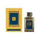 A rectangular gold and blue perfume bottle with a matching box. The box displays geometric line patterns and the words "Aesthetic Edition" and "Azule Elite." The bottle features a blue label framed by gold lines, a gold-toned cap, and a small decorative chain hanging from the neck.