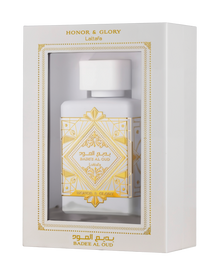 This image displays a perfume package with a white rectangular box that has a window showing the bottle inside. The box is labeled "HONOR & GLORY Lattafa" at the top, with intricate gold geometric and floral designs around the window and on the lower part