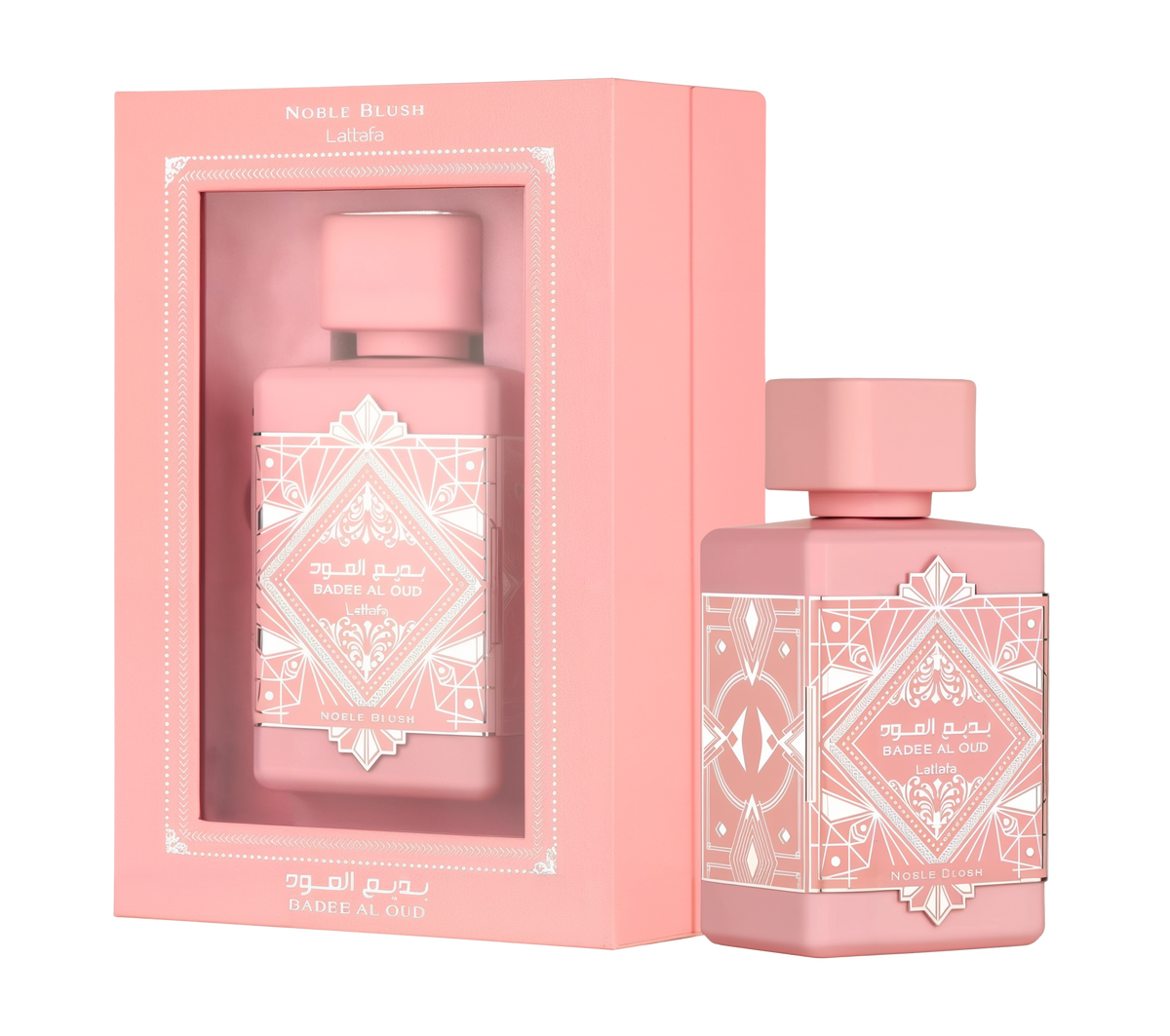 A pink rectangular box with a transparent window, labeled ‘Badee Al Oud Noble Blush’ by Lattafa, displayed next to a matching pink perfume bottle adorned with intricate white geometric patterns and a square cap