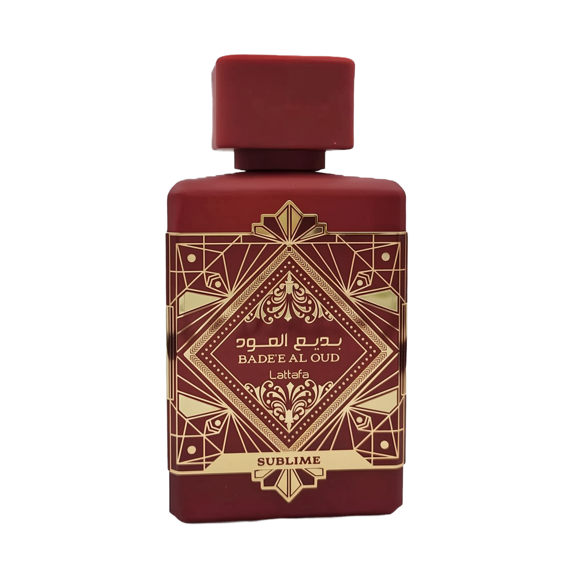 This image shows a deep burgundy perfume bottle with the name "BADEE AL OUD SUBLIME" from the brand Lattafa. The bottle has a matte finish with a matching square cap. It features a luxurious gold geometric pattern with traditional motifs, and the name is written in both Arabic and English. The word "SUBLIME" is displayed on a gold banner at the base. The design conveys a sense of rich heritage and sophistication.
