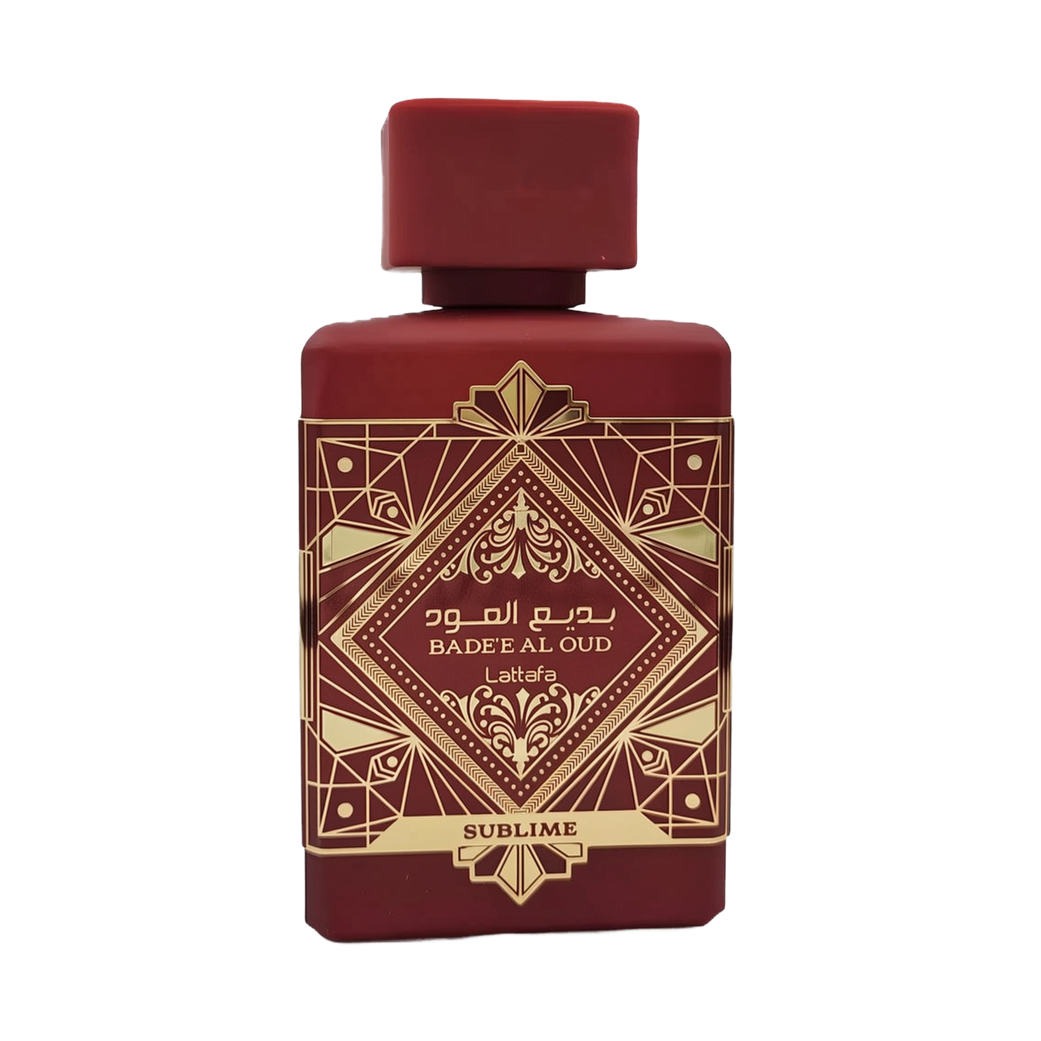 This image shows a deep burgundy perfume bottle with the name "BADEE AL OUD SUBLIME" from the brand Lattafa. The bottle has a matte finish with a matching square cap. It features a luxurious gold geometric pattern with traditional motifs, and the name is written in both Arabic and English. The word "SUBLIME" is displayed on a gold banner at the base. The design conveys a sense of rich heritage and sophistication.