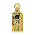 The image shows a luxurious perfume bottle. The bottle has a golden color with intricate arabesque patterns carved into its metal exterior, giving it a very ornate and decorative appearance. The cap of the bottle is also golden and has a circular handle, likely for aesthetic purposes. In the center of the bottle, there is a black label with the word "BAYAAN" written in stylized white Arabic script. The background is plain, highlighting the detailed craftsmanship and opulent design of the perfume bottle.