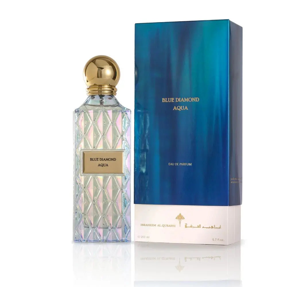 The image displays a clear, faceted glass perfume bottle with a gold cap and a label that reads "BLUE DIAMOND AQUA" by Ibraheem Al Qurashi, positioned to the left of its packaging. The packaging is a tall box with a blue ombre design fading into white, with the same name "BLUE DIAMOND AQUA" and the description "EAU DE PARFUM" printed on it. The volume of the perfume is indicated as 200 ml (6.7 fl.oz) at the bottom of the box.