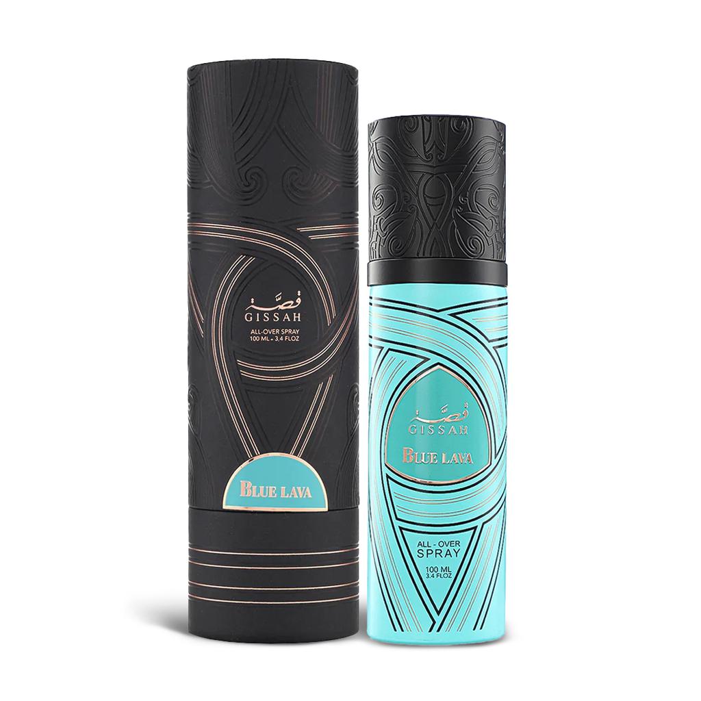 A cylindrical turquoise bottle of Gissah Blue Lava all-over spray with a capacity of 100 mL (3.4 FL OZ), displayed next to its matching cylindrical black packaging. The bottle features intricate black patterns and a black cap with similar detailed designs. The Gissah brand name and "Blue Lava" are prominently displayed in gold lettering on the front of the bottle. The packaging features the same elegant black patterns and turquoise accents.