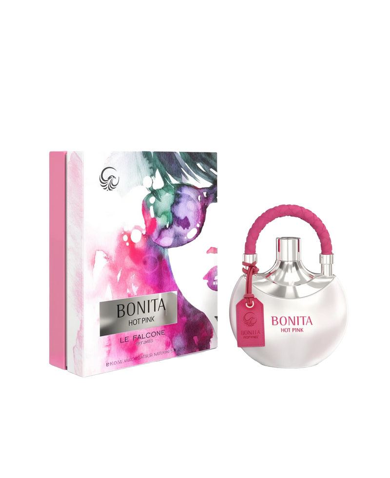 A silver, spherical perfume bottle labeled “Bonita Hot Pink” with a bright pink handle and matching hangtag sits next to a rectangular box featuring pink, purple, and green watercolor artwork, along with the brand name “Le Falcone Perfumes.