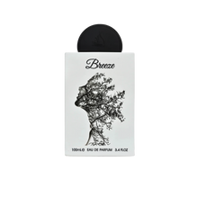 The image displays a perfume package named "Breeze" by Lattafa. The box is white and features an artistic silhouette of a woman's profile composed of tree branches, embodying the name "Breeze." Above the silhouette is the product name in a simple, modern 