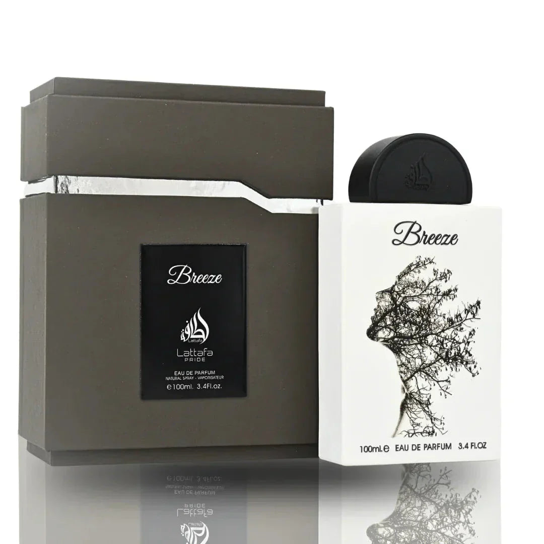 The image features the "Breeze" perfume by Lattafa, presented with its box. The perfume box is dark gray with a lighter gray lid, and it has a sleek black label with "Breeze" in white lettering and the Lattafa logo in white above it.  On the right side of