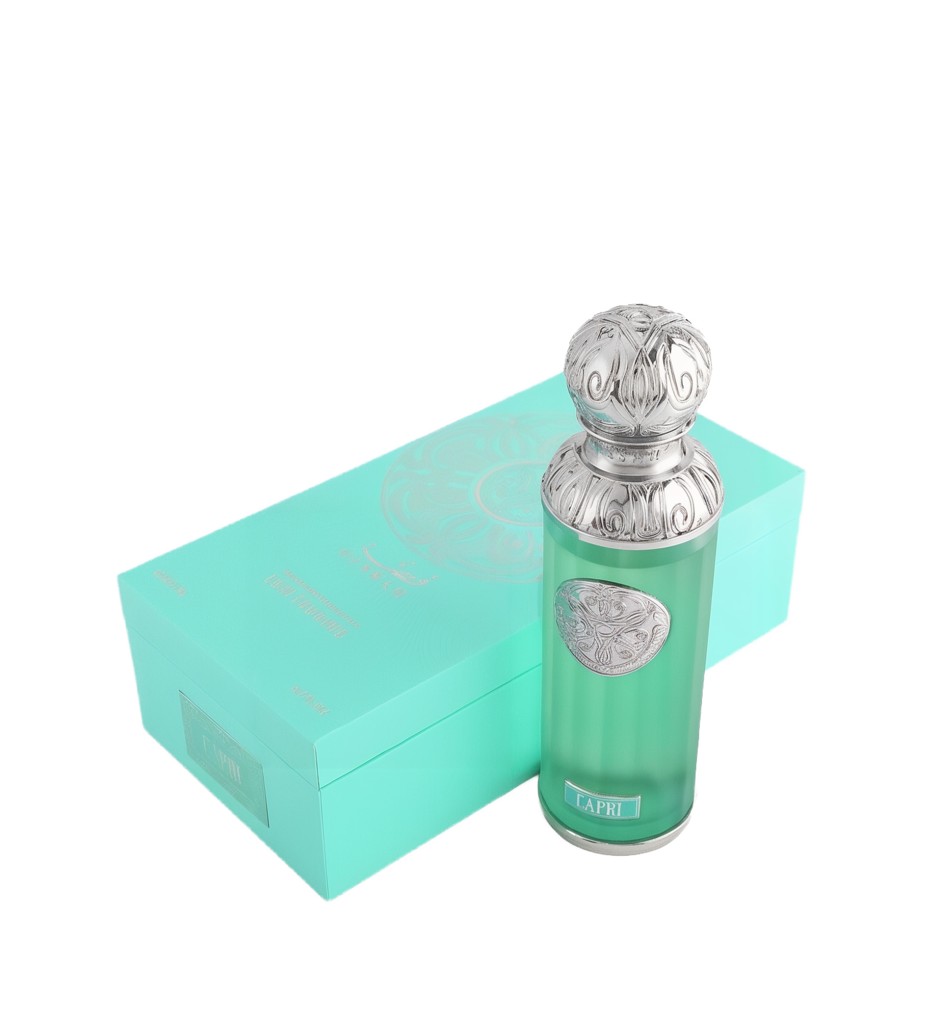 The image shows a perfume bottle named "Capri" from the Gissah collection, placed next to its packaging. The perfume bottle is cylindrical with a teal glass body and a decorative silver cap featuring intricate embossed patterns. A silver medallion with an ornate design is affixed to the front of the bottle. The packaging is a matching teal box with a mandala-like design and the names "Gissah" and "Capri" printed on it.